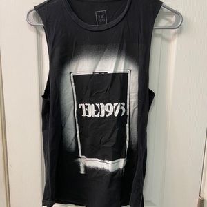 Official 1975 Cut off tank top women’s large